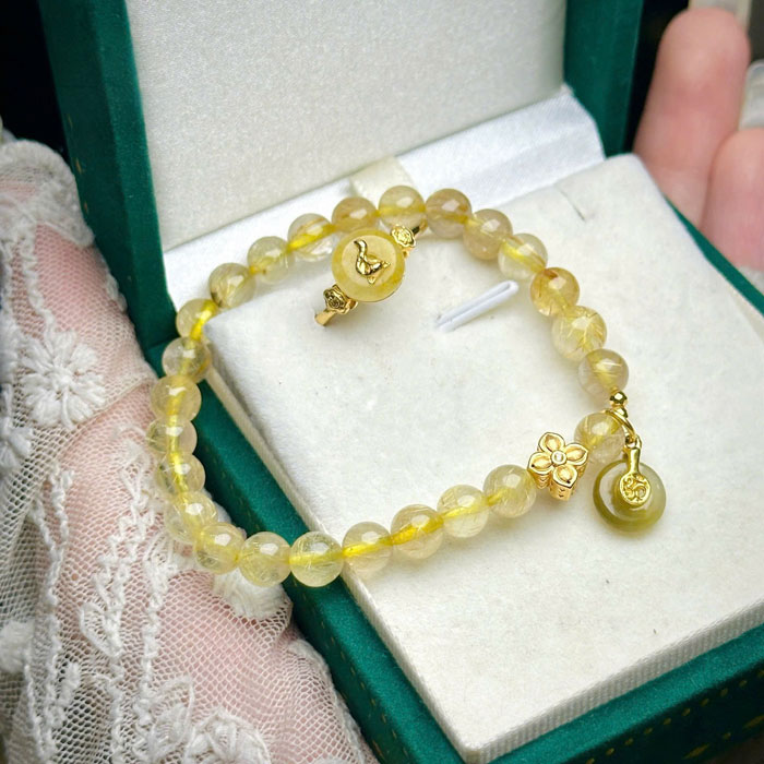 Combo Nhẫn Điếu Vàng 10k + Vòng Tay Phong Thủy Thạch Anh Tóc Vàng 6mm Charm Vàng